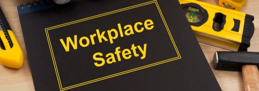 Image of Workplace Safety Manual, along with work tools