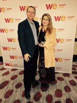 Strategic HR president, Robin Throckmorton, is pictured with her husband, John, showcasing her newly won Woman Owned Business of the Year Award