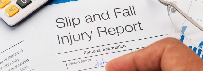 Image of a person filling out an injury report