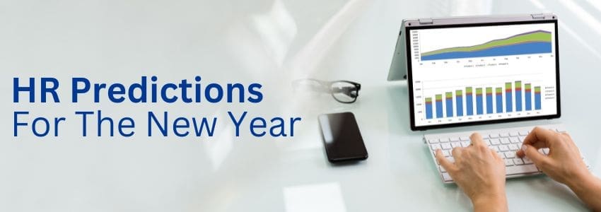Image for HR Predictions for the New Year including HR professional reviewing trends on computer.
